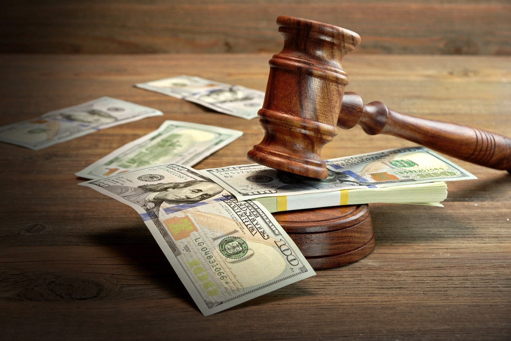 Counterclaims In Civil Actions - Judges or Auctioneer Gavel And Money On The Wooden Table